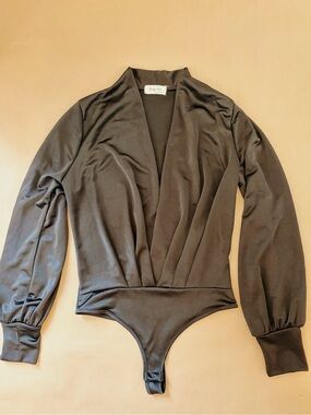 Black Satin Spring Haze long sleeve bodysuit with plunge neck.